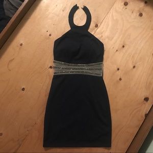 Navy blue dress. Length is to the knee.